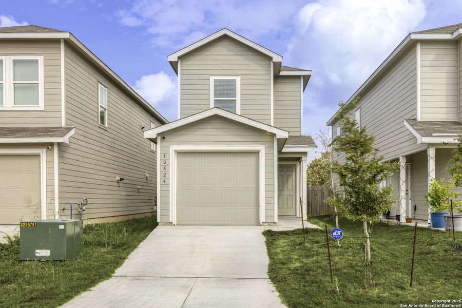 Front exterior of a new home in Presa Point, San Antonio, TX, highlighting curb appeal (Image 2).