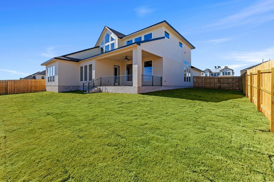 Exterior details and patio area of a home in Lariat, Liberty Hill (Image 25).