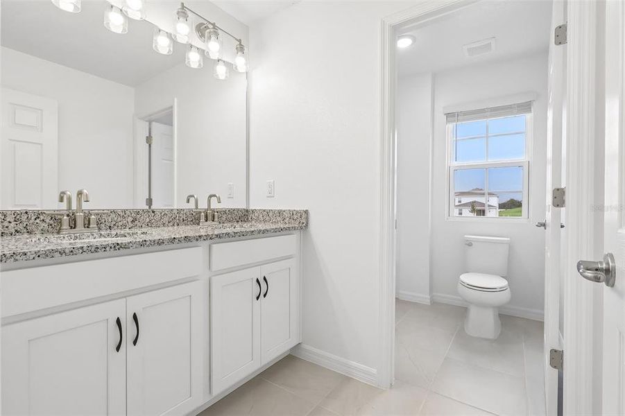 Furnished interior view inside a new home in Eagletail Landings, Howey-in-the-Hills (Image 7).