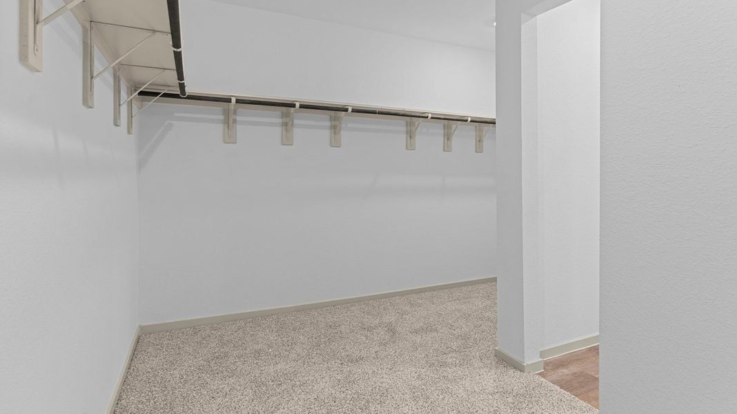 Representative unfurnished interior of a home built from the Davis by D.R. Horton in Watermark, Alvin (Image 19). Representative unfurnished interior of a home built from the Davis by D.R. Horton in Watermark, Alvin (Image 19).