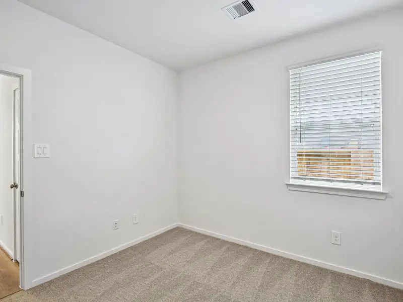 Spacious, unfurnished interior of a new home in Riviera Pines - Premier Series, Huffman (Image 12).