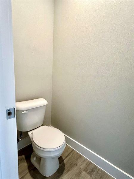 Water closet in the primary bathroom.