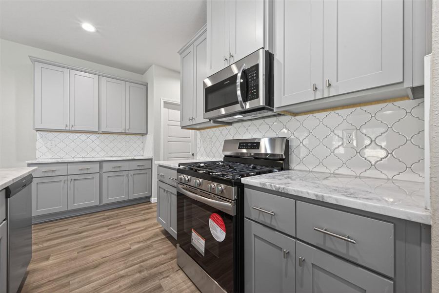 Furnished interior view inside a new home in Woodland Lakes, Huffman (Image 11).