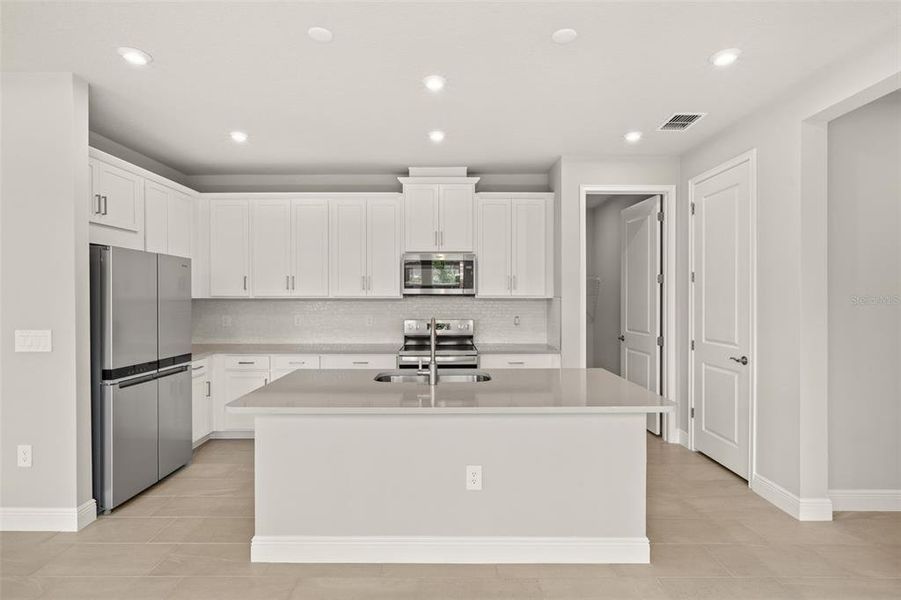 Furnished interior view inside a new home in Brightmore at Wellen Park, Venice (Image 8).