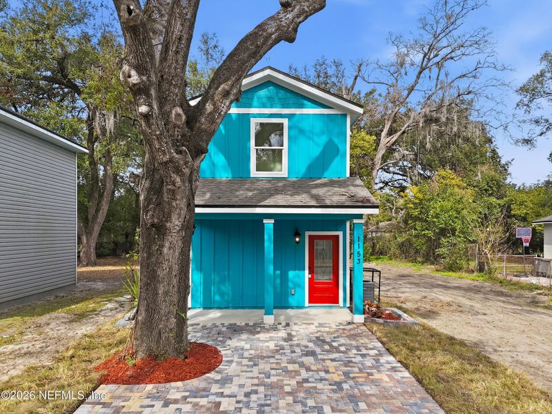 Front exterior of a new home in , Jacksonville, FL, highlighting curb appeal (Image 17).