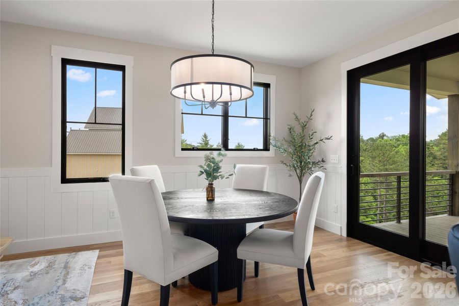 Dining room with mountain views and upper porch access
