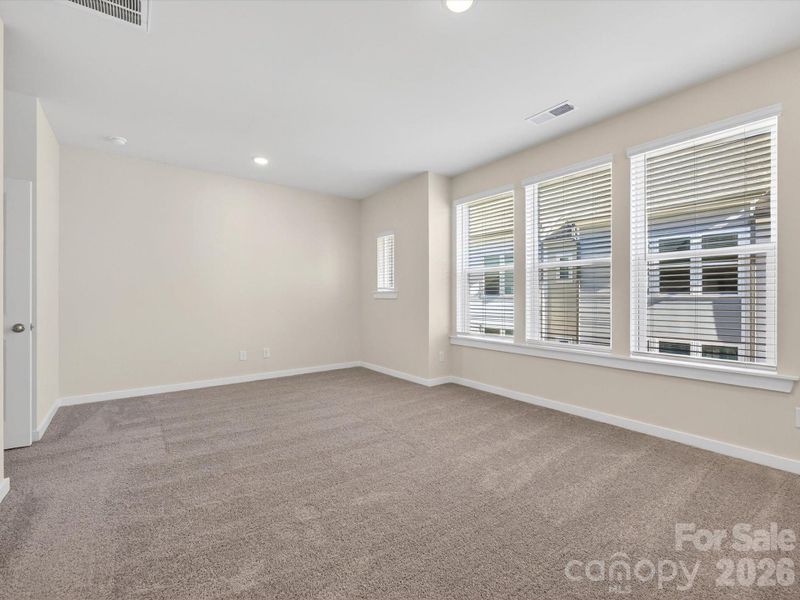 Spacious, unfurnished interior of a new home in Central Living at Craig, Charlotte (Image 23).