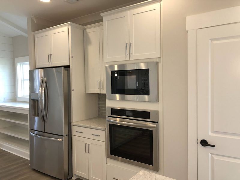 Furnished interior view inside a new home in Osprey Landing, Southport (Image 7).