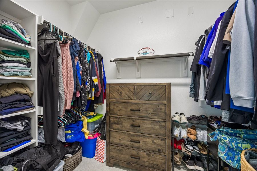 Walk-in primary closet Walk-in primary closet