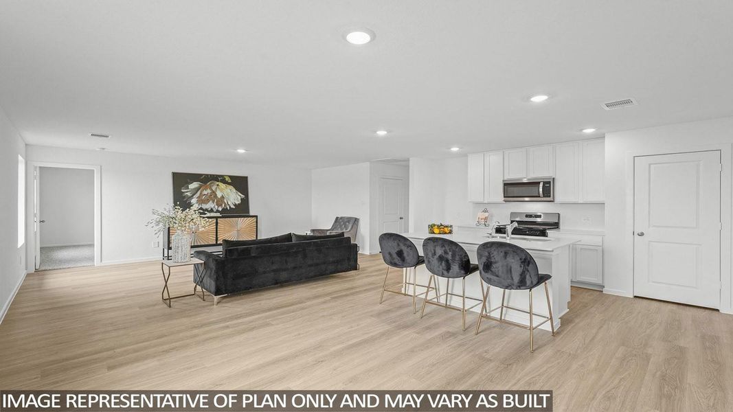 Furnished interior view inside a new home in Sunterra, Katy (Image 7).