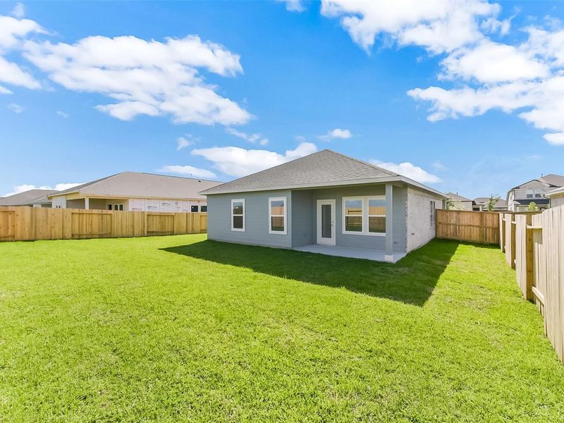 Exterior details and patio area of a home in River Ranch Meadows, Dayton (Image 32).