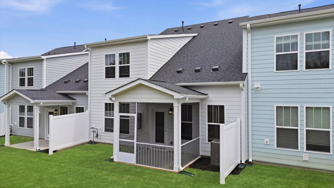 Rear screened-in porch creates a seamless extension of this home’s elegant design at Village at Midway Rear screened-in porch creates a seamless extension of this home’s elegant design at Village at Midway