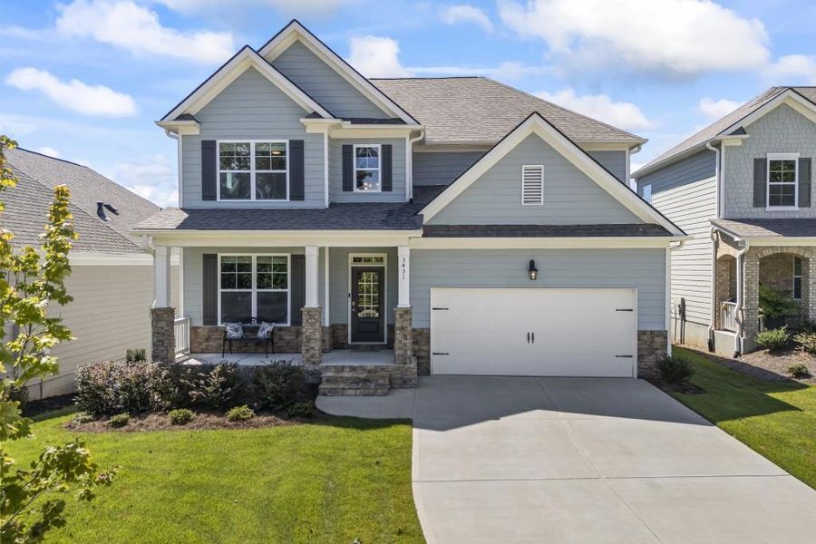 Front exterior of a new home in The Cottages Of Lake Lanier, Gainesville, GA, highlighting curb appeal (Image 24).