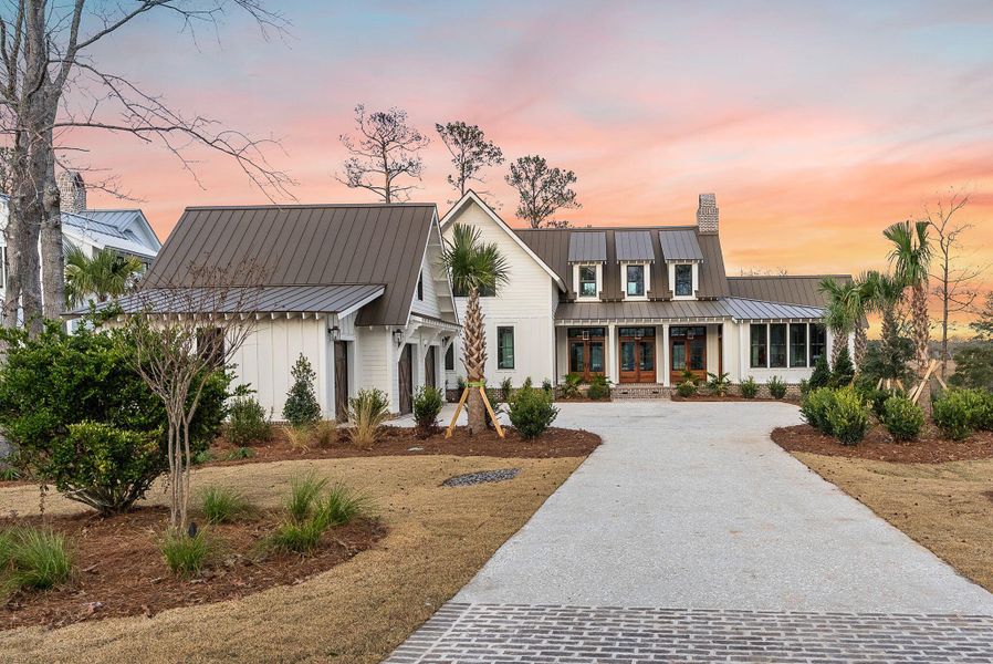 Front exterior of a new home in , Ravenel, SC, highlighting curb appeal (Image 8).