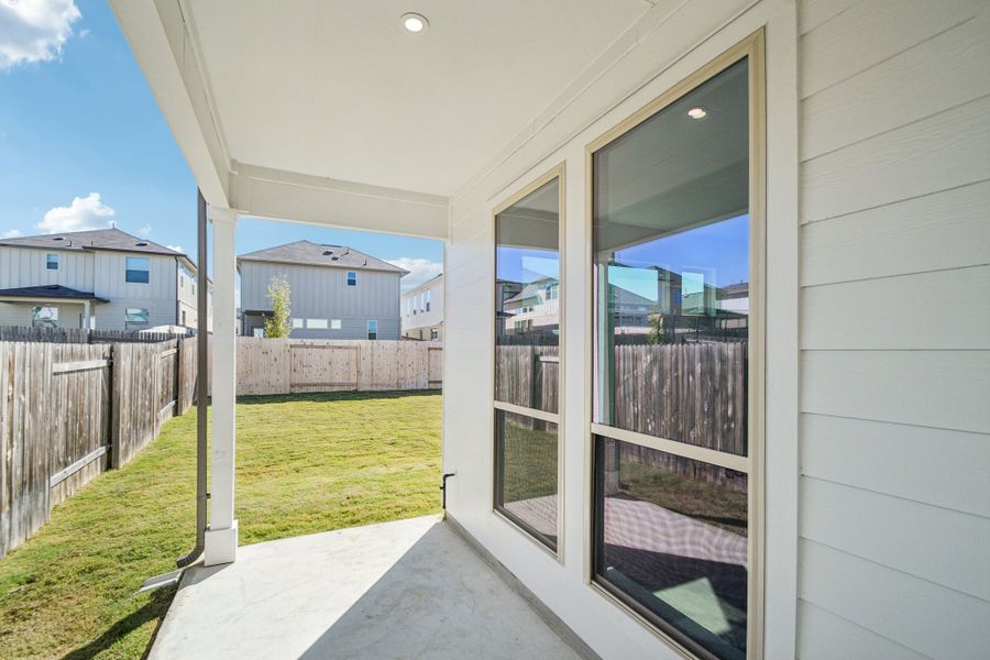 Exterior details and patio area of a home in Crosswinds, Kyle (Image 17).