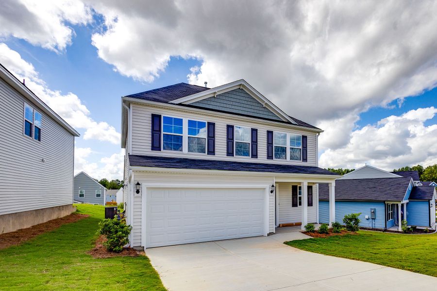 Front exterior of a new home in Bluefield, Lexington, SC, highlighting curb appeal (Image 2). Front exterior of a new home in Bluefield, Lexington, SC, highlighting curb appeal (Image 2).