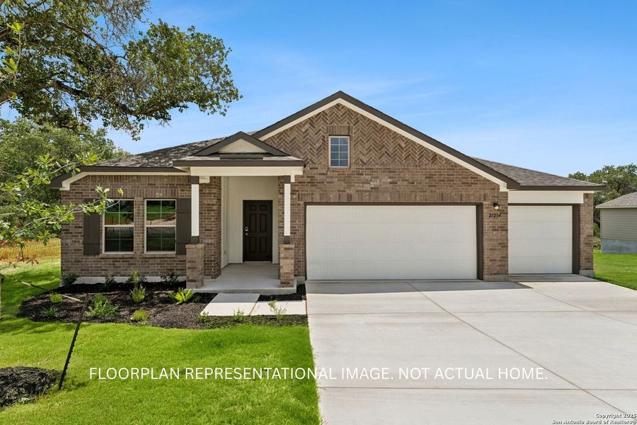 Front exterior of a new home in Chaparral Ranch, Floresville, TX, highlighting curb appeal (Image 1). Front exterior of a new home in Chaparral Ranch, Floresville, TX, highlighting curb appeal (Image 1).
