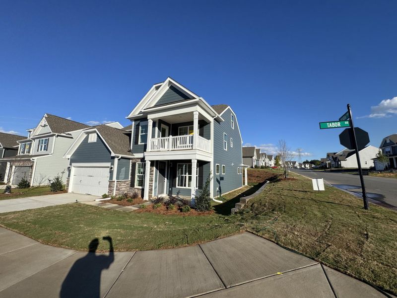Front exterior of a new home in The Enclave at Laurelbrook, Sherrills Ford, NC, highlighting curb appeal (Image 2). Front exterior of a new home in The Enclave at Laurelbrook, Sherrills Ford, NC, highlighting curb appeal (Image 2).