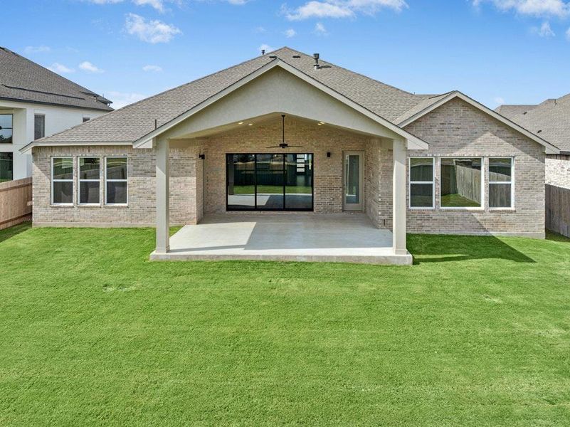 Exterior details and patio area of a home in Santa Rita Ranch, Liberty Hill (Image 24).