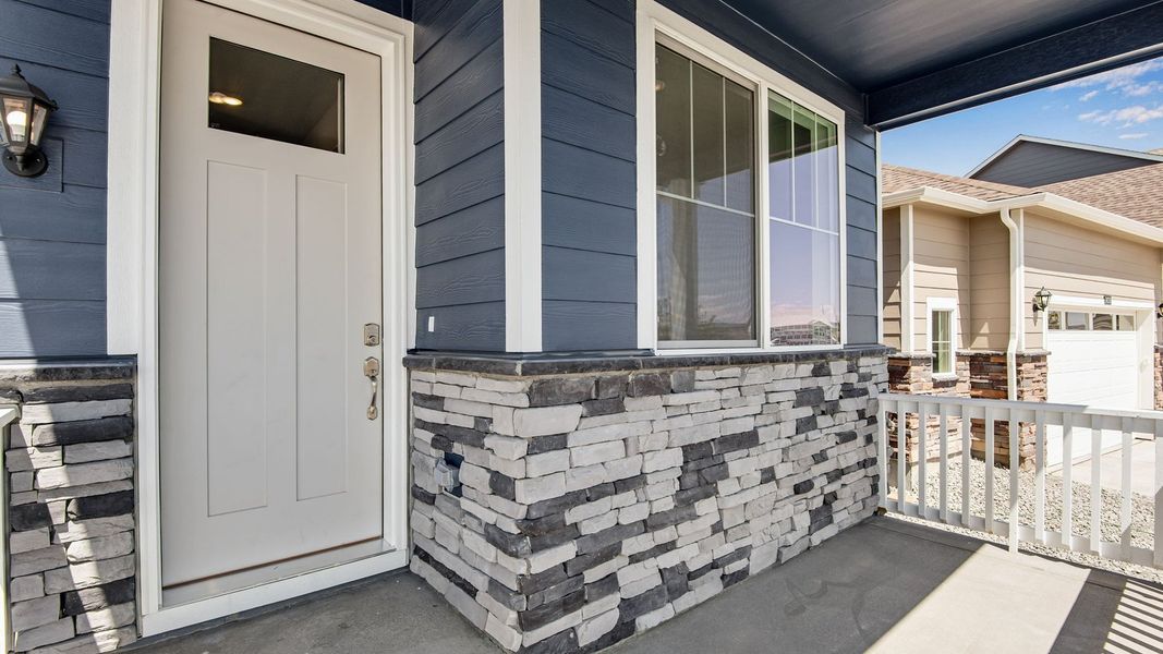 Exterior details and patio area of a home in Trails at Crowfoot, Parker (Image 3).