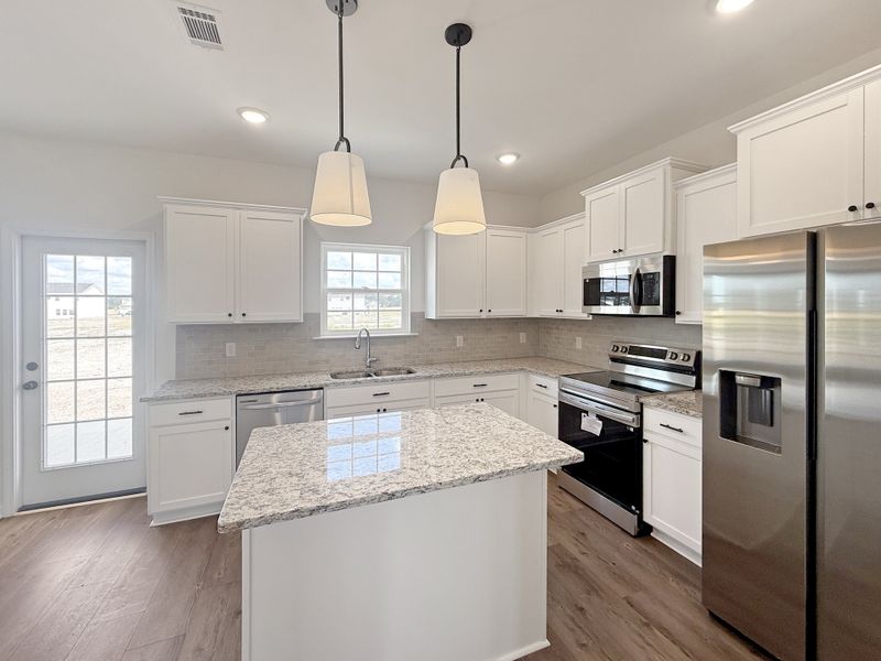 Furnished interior view inside a new home in The Village at Sassafras, Allenhurst (Image 7).
