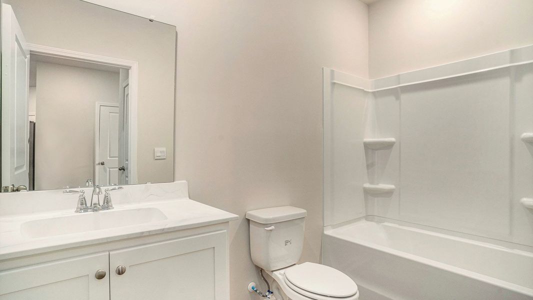 Furnished interior view inside a new home in Rich Square at Brunswick Plantation, Ash (Image 8). Furnished interior view inside a new home in Rich Square at Brunswick Plantation, Ash (Image 8).