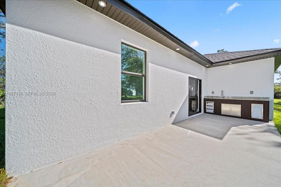 Exterior details and patio area of a home in , Lehigh Acres (Image 24).