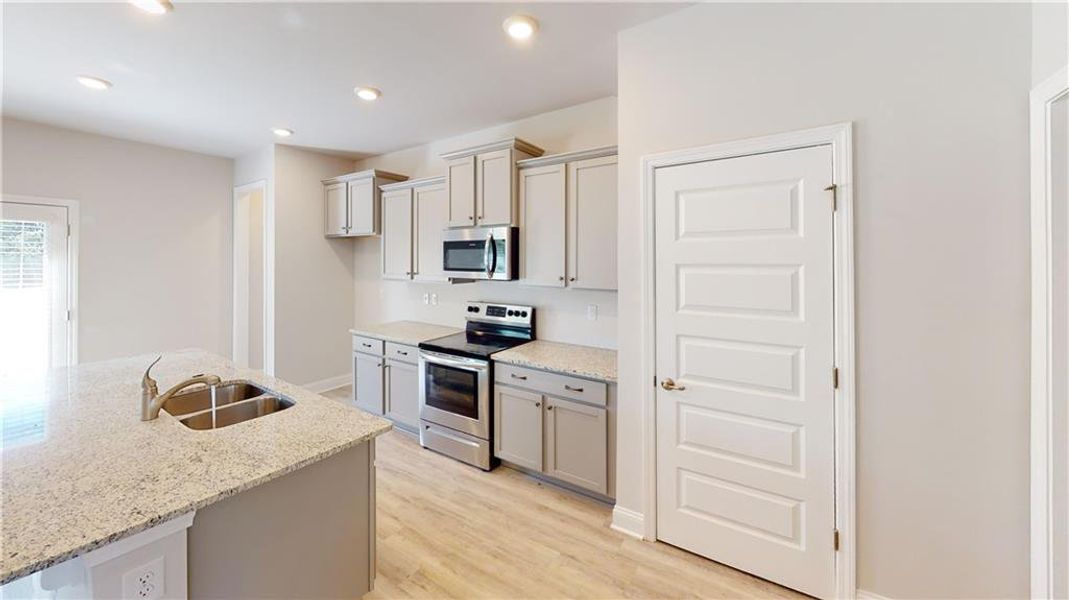 Furnished interior view inside a new home in Holliday Pass, Griffin (Image 6).