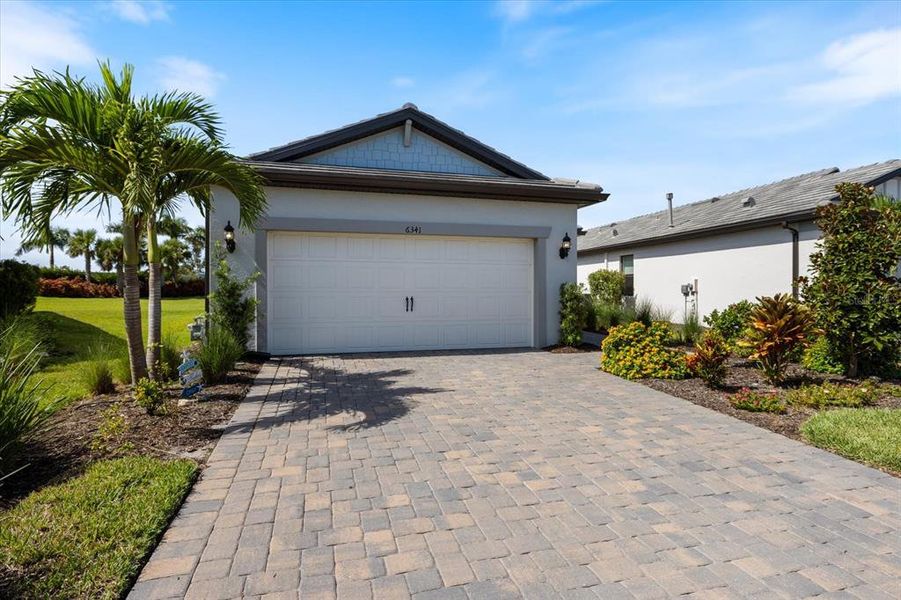 Front exterior of a new home in , Nokomis, FL, highlighting curb appeal (Image 19).