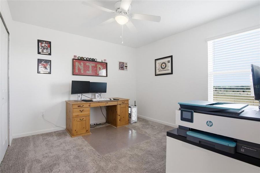 Furnished interior view inside a new home in Wellness Ridge, Clermont (Image 32).