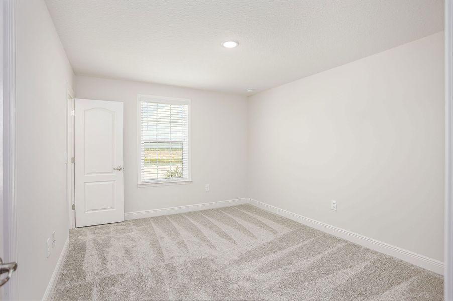 Representative unfurnished interior of a home built from the Carrington by Maronda Homes in Malabar Springs, Palm Bay (Image 25).