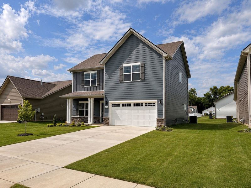 Front exterior of a new home in Salem Landing, Rockvale, TN, highlighting curb appeal (Image 18). Front exterior of a new home in Salem Landing, Rockvale, TN, highlighting curb appeal (Image 18).