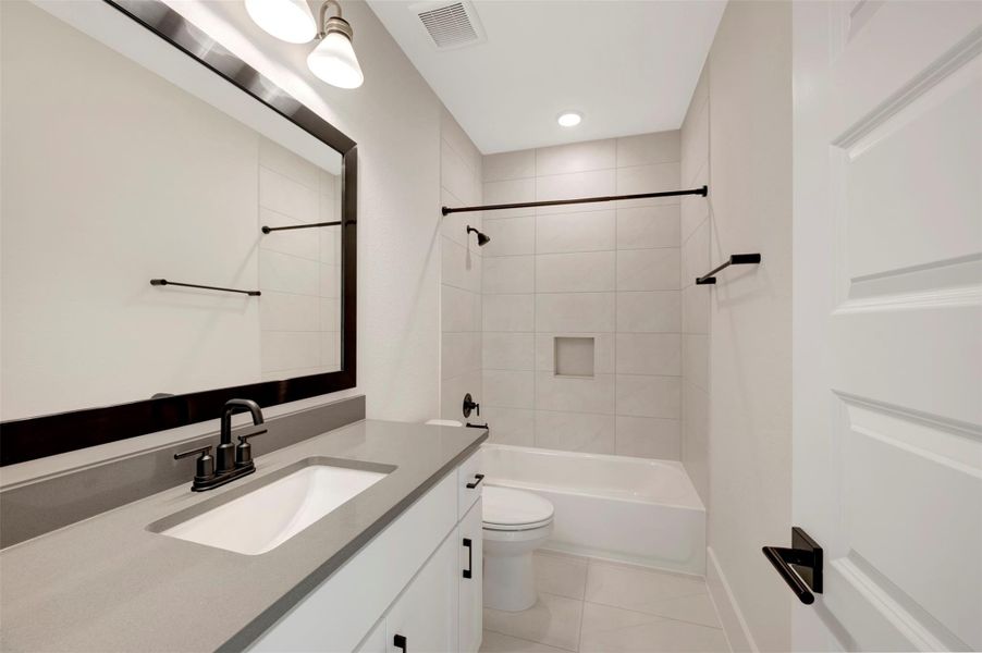 Furnished interior view inside a new home in Easthaven at Bridgeland Central - Vision Collection, Cypress (Image 11).