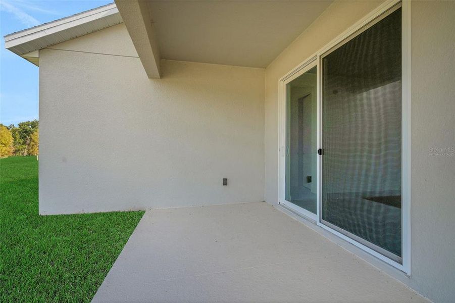 Exterior details and patio area of a home in Reserve at Hammock Oaks, Lady Lake (Image 22).