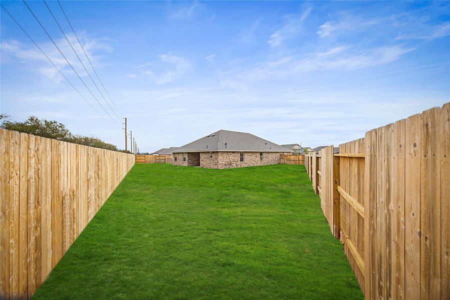 Exterior details and patio area of a home in River Ranch Trails, Dayton (Image 21).