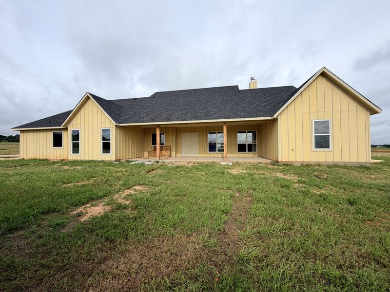 Front exterior of a new home in Parallel Pastures, Poolville, TX, highlighting curb appeal (Image 2). Front exterior of a new home in Parallel Pastures, Poolville, TX, highlighting curb appeal (Image 2).