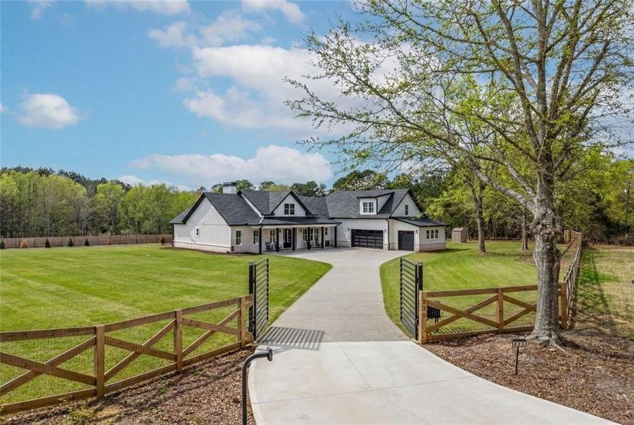 Front exterior of a new home in , Bethlehem, GA, highlighting curb appeal (Image 22).