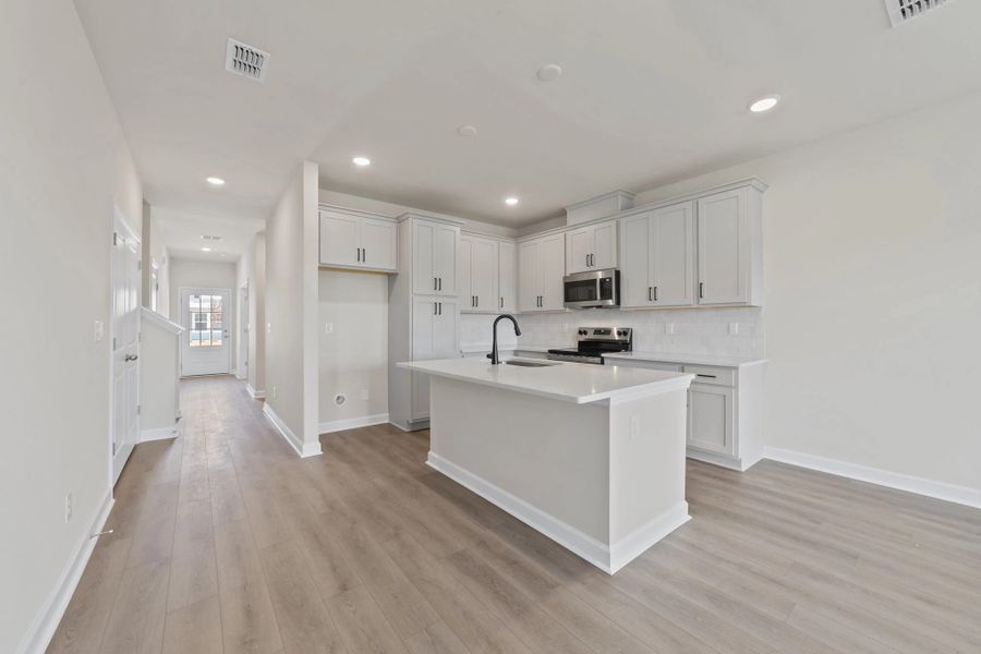 Furnished interior view inside a new home in Blue Heron Retreat, Little River (Image 8).