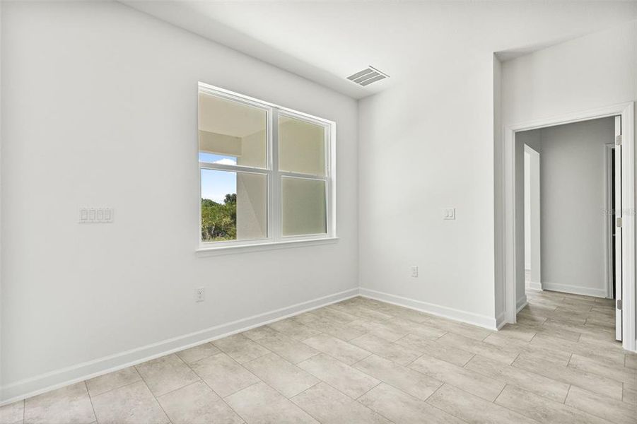 Spacious, unfurnished interior of a new home in , Port Charlotte (Image 43).