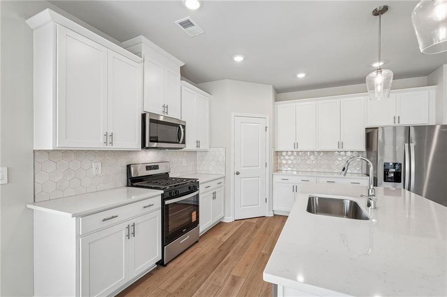 Furnished interior view inside a new home in Northwoods at Mirror Lake, Villa Rica (Image 13).