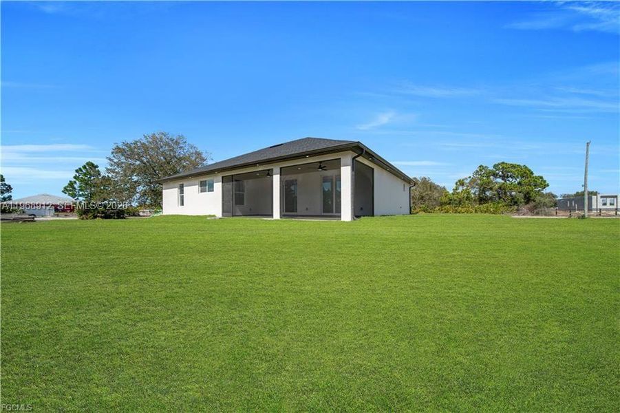 Exterior details and patio area of a home in , Labelle (Image 4).