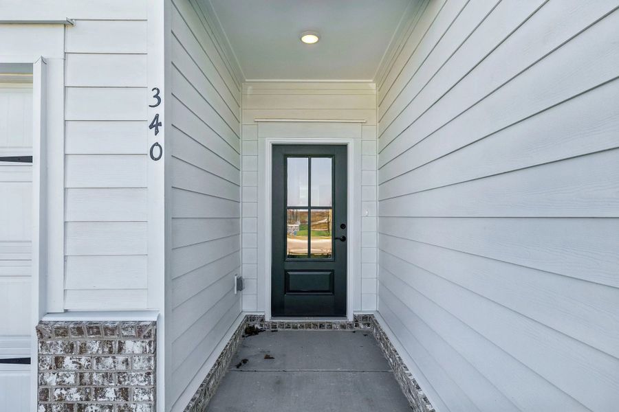 Exterior details and patio area of a home in Cedars of Cane Ridge | 55+ Community, Antioch (Image 3).