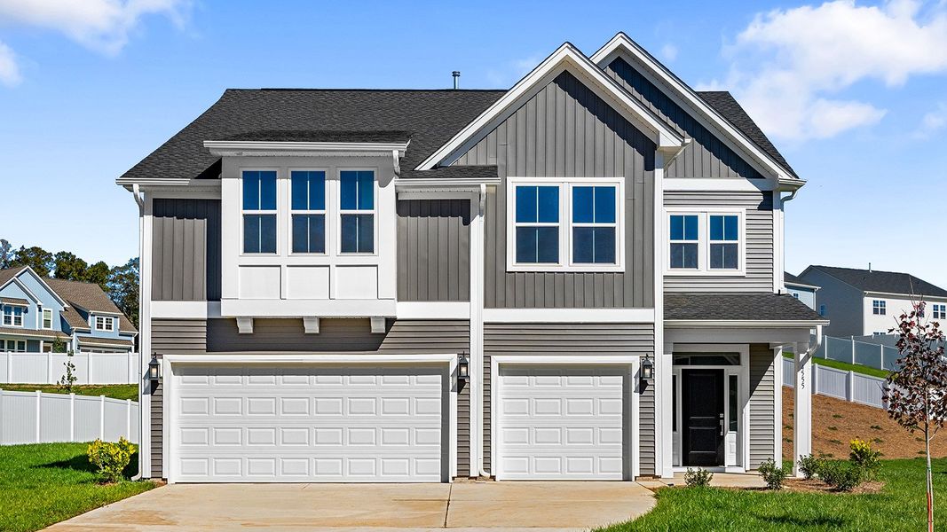Front exterior of a new home in Hanes Lake, Winston-Salem, NC, highlighting curb appeal (Image 1).