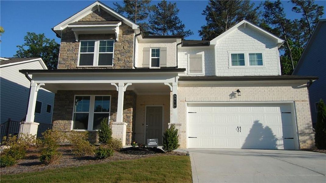 Front exterior of a new home in Bailey Fence, Dacula, GA, highlighting curb appeal (Image 28). Front exterior of a new home in Bailey Fence, Dacula, GA, highlighting curb appeal (Image 28).