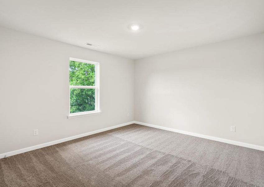 The secondary bedroom makes the perfect space for a children's playroom