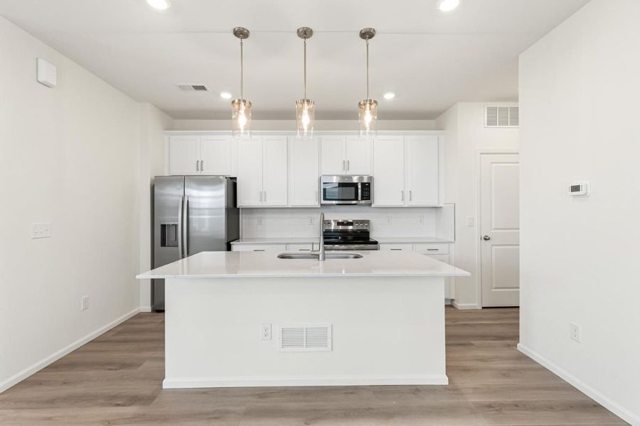 Furnished interior view inside a new home in Painted Prairie Villas, Aurora (Image 6). Furnished interior view inside a new home in Painted Prairie Villas, Aurora (Image 6).