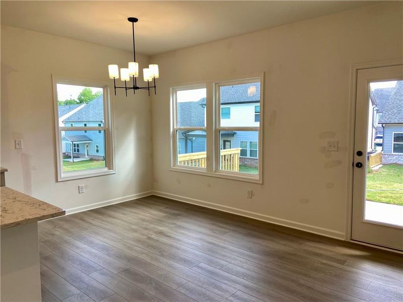 Spacious, unfurnished interior of a new home in Eastlyn Crossing, Flowery Branch (Image 14).