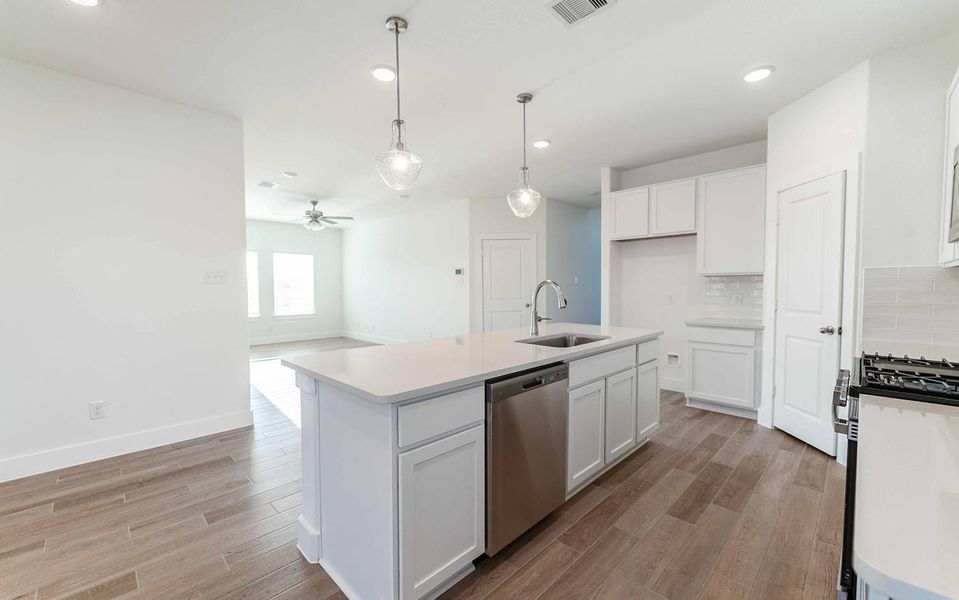 Furnished interior view inside a new home in Massey Oaks, Pearland (Image 6). Furnished interior view inside a new home in Massey Oaks, Pearland (Image 6).