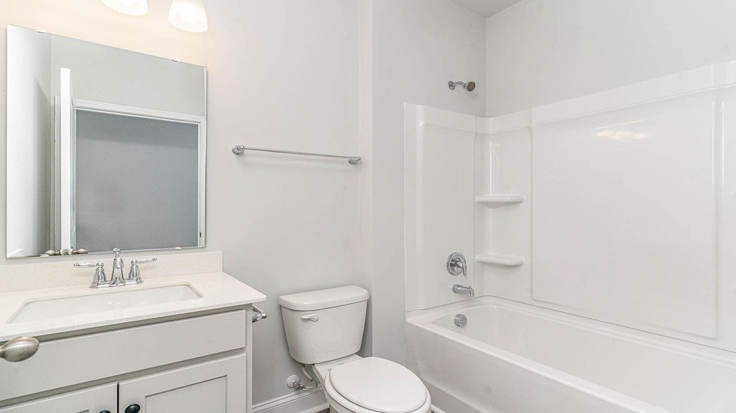 Representative furnished interior of a home built from the HARBOR OAK by D.R. Horton in Haven View, Murrells Inlet (Image 9).