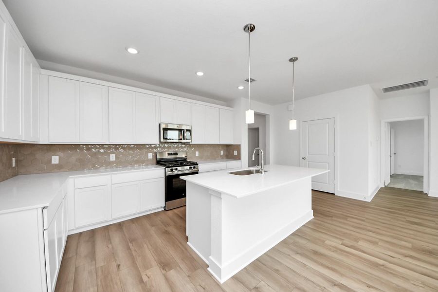 Furnished interior view inside a new home in The Canopies, Splendora (Image 9).